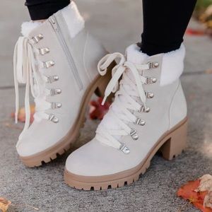 Cream lace-up booties with faux fur